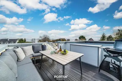 Image de Meerliebe - sea view, roof terrace, infrared sauna, shower, e-charging station