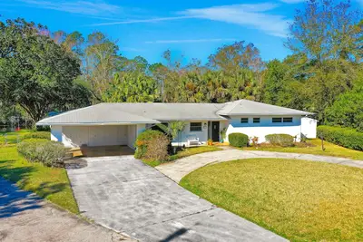 Image de Mid-century modern lake house with dock & Florida room - quick drive to beach