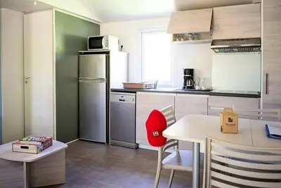 Image de Mobil-home Confort 35 m² (3 chambres) + Lv + Tv + terrasse semi-couverte 6m² 8 personnes