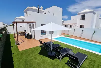 Image de Maison de vacances 'Casa Atlantida' avec vue sur la mer, jardin, piscine et Wi-Fi.