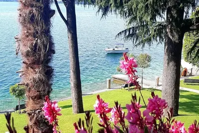 Image de Appartamento direttamente a lago con spiaggia e pontili