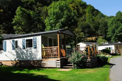 Image de Mobilheim Komfort Evasion 24m2 - 2 Schlafzimmer - halb überdachte Terrasse 12m2 + 4 Personen