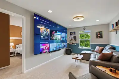 Image de Epic 140 inch Tv Wall + Game Consoles Galore