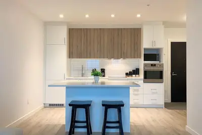 Image de Cozy 1br Condo w/ In-Suite Laundry, Gym, Free Parking and Full Kitchen