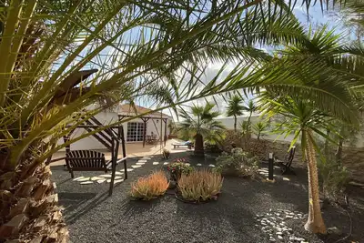 Image de Casa Aura, feel-good oasis, 102 sqm vacation home with palm trees, terraces and garden