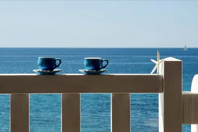 Image de Typical Mediterranean home by the sea with large terrace