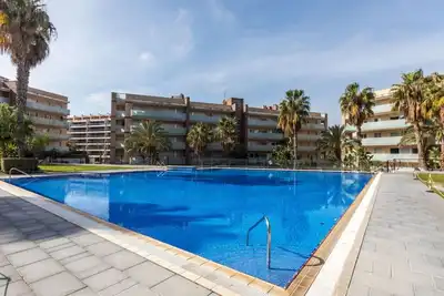 Image de Confortable appartement avec climatisation, Wifi, bain Ă remous, piscine, Tv, terrasse et parking