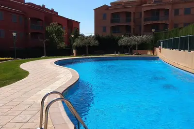 Image de Acojedor Apartamento Familiar Con Piscina Comunitaria Marina Sant Jordi (Msj72)