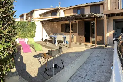 Image de Maison dans un domaine fermé à 10 minutes de la plage à pied
