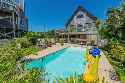 Dog-friendly home with private pool, firepit, fenced yard, covered patio, & deck