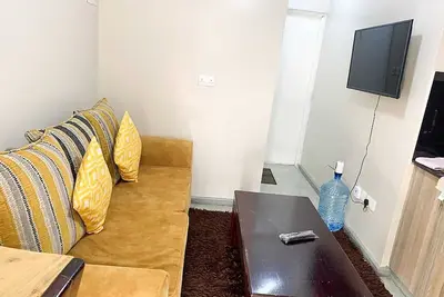 Image de Cozy one bedroom -5 min from the junction mall (with a study area)