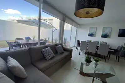 Image de 5 minutes to Industrial Zone! Family-sized condo with pool, gym and playground