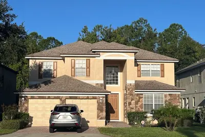 Image de Exceptional 5 bedroom home, gated community, less than 30 mins from attractions.