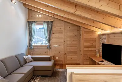 Image de Appartement \"Majon De Rita\" avec vue sur les montagnes, bain Ă remous et Wi-Fi.
