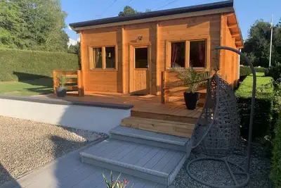 Image de Chalet 2 personnes avec jacuzzi et piscine partagée