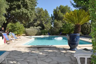 Image de Green setting with Sea View\nMaison dans un écrin de verdure Vue Mer et Piscine