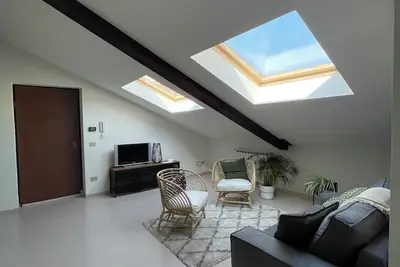 Image de Bright attic apartment with balcony in the center of Asti