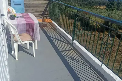 Image de Apartment above Peroulia beach near Koroni - taverna in front of the house
