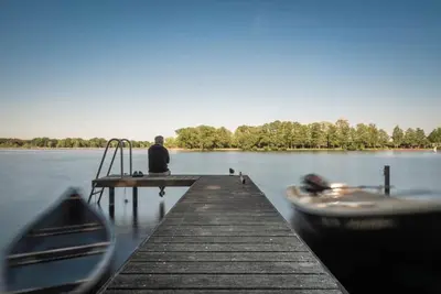 Image de House on the Havelbogen directly on the water with canoe and jetty, garden apartment*****