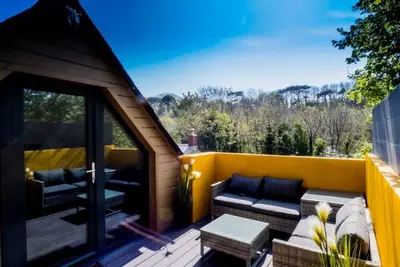 Image de Chy Glynn. Luxury lodge with hot tub and views.