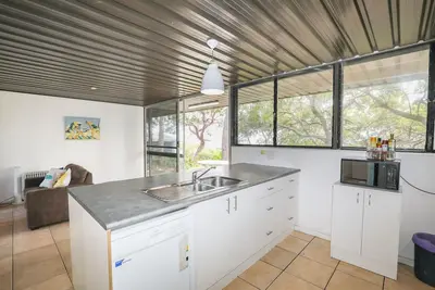 Image de Mi Casa Su Casa is a basic 3 bedroom 70’s style home
