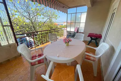Large homely family apartment with two bedrooms and a balcony