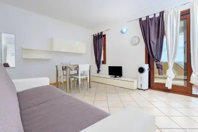 Image de Maison de vacances 'Residence Orizzonti App N 23' avec vue sur la mer, terrasse privée et climatisation