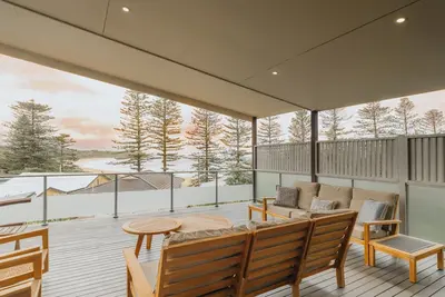 Image de Sand may brush off your feet but memories at The Coast House last forever.