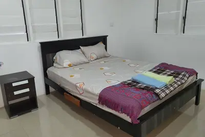 Image de Master Bedroom with Shared Kitchen and Living Room
