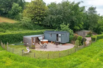 A shepherds hut that sleeps 2 guests  in 1 bedroom