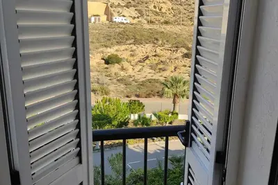 Image de Apartment with a fantastic view of the swimming pool and the sea