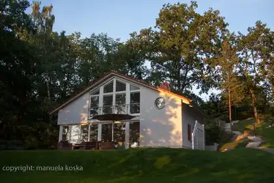 Image de Ferienhaus Direkt am See