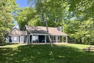 Image de Dog-friendly secluded home near Suttons Bay with water views, firepit, fireplace