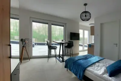 Image de Penthouse apartment no. 10 on the 2nd floor on the right (garden view, large roof terrace)
