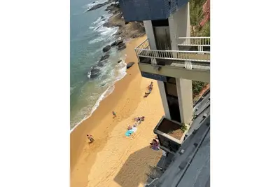 all 3 bedrooms with views of the black sand beach