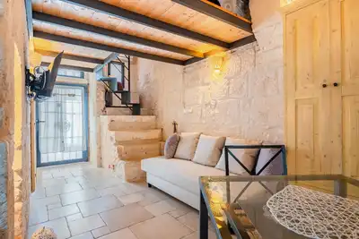 Image de Studio Appartement 'Casetta In Pietra Ostuni' avec climatisation.