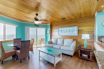 Updated ocean-view condo with 2 balconies, pool, hot tub, W/D, & Ac