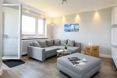 Image de The apartment is divided into a living room with dining area for 4 people. . .