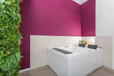 Image de Appartement 'Taormina Center Suite' avec Baignoire Balnéo dans la Chambre
