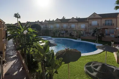 Image de El Deseo - Wonderful apartment with shared pool in Chiclana de la Frontera.