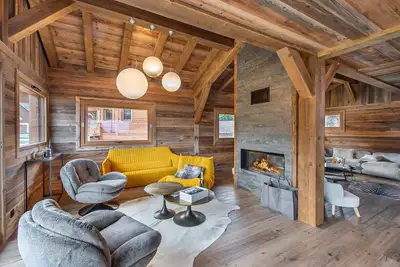 Image de Chalet neuf avec sauna, garage, terrasse et services inclus à Combloux
