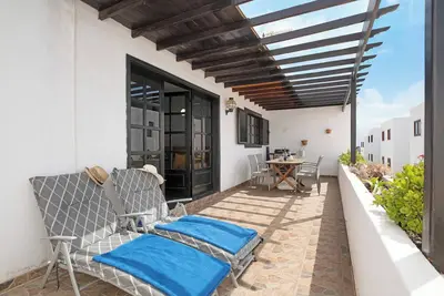 Image de Maison de vacances 'Apartamento Acogedor' avec terrasse privée, jardin privé et Wi-Fi.