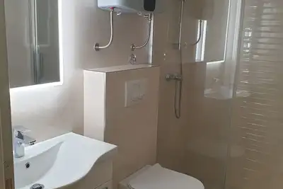 Image de Comfortable studio apartment with patio, two minutes walk from the nearest beach
