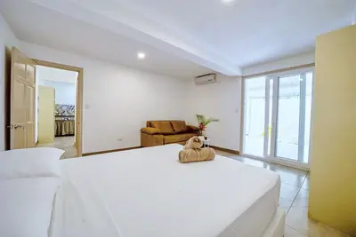 Image de A/C & WiFi | Next to the Beach on the Main Road!
