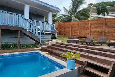 2 bdrm home with private pool, ocean views & great outdoor Bbq space.