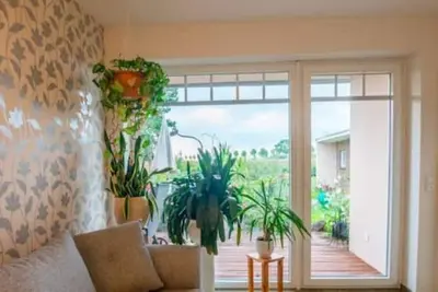 Image de First floor apartment with garden
