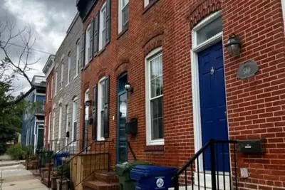 Image de Cozy Historic Brick Exposed Town house with Rooftop Deck overlooking Balt Harbor