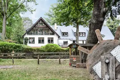 Image de 1 room apartment directly on the Schwielowsee with bathing access and garden
