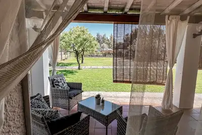 Image de Maison Claire avec accès direct à la plage