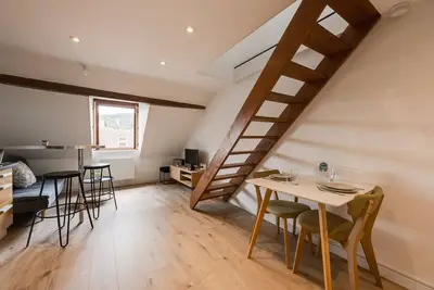 Image de Duplex Vue Montagne - idéalement placé avec sa vue sur les toits